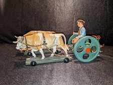 Kartoffelroder mit Zugochsen